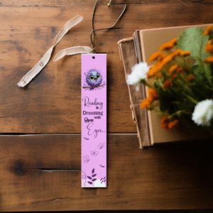 Whimsical Purple Owl Bookmark featuring a cute owl and reading quote.